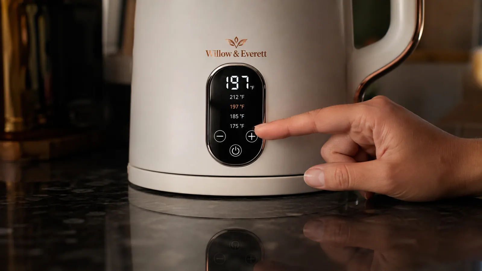 Digital temperature display on the kettle base glowing in a dim kitchen